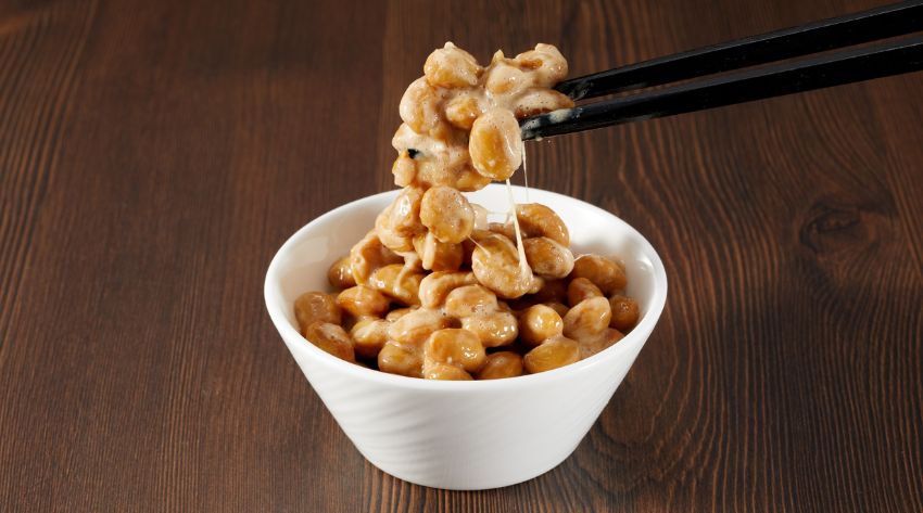 japanese natto in a bowl where nattokinase enzyme is derived from